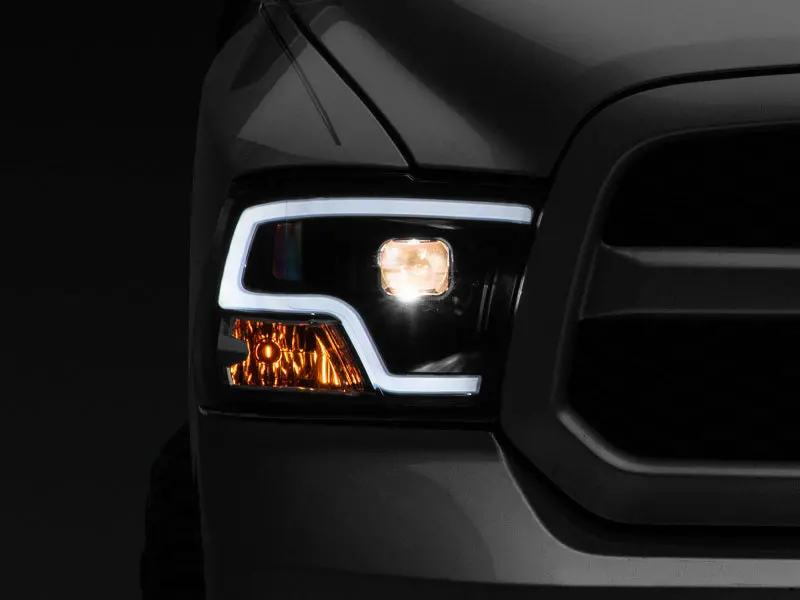 Raxiom Led Halo Projector Headlights For 2009–2018 Ram 1500 – Black Housing With Clear Lens 1